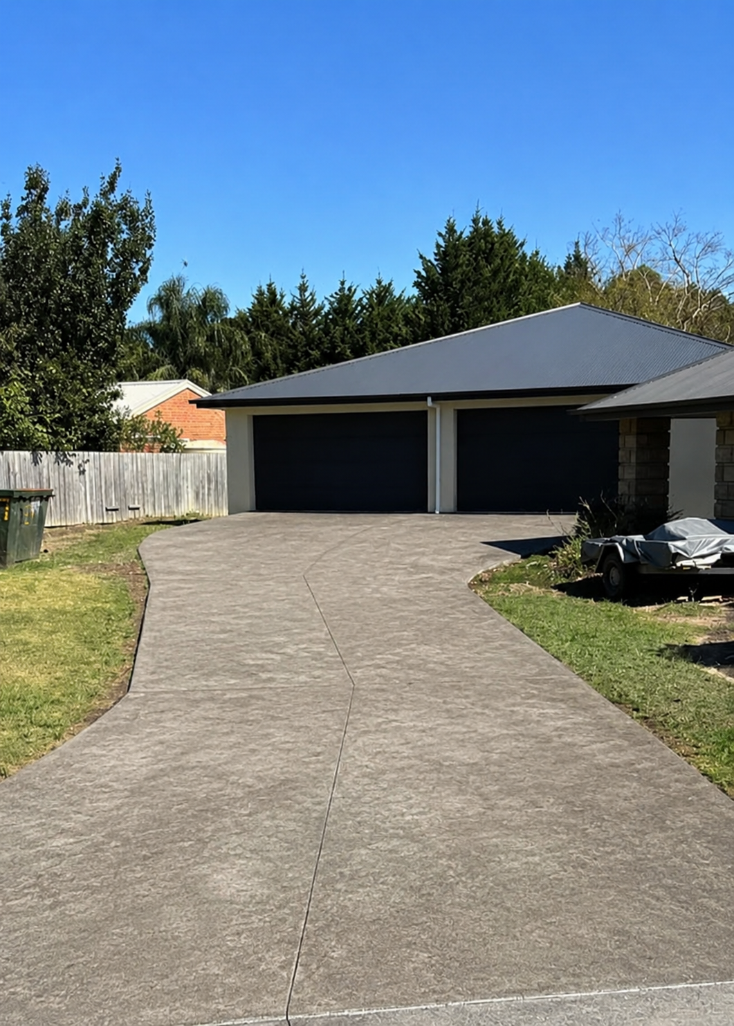 Before — Concrete driveway before and after painting
